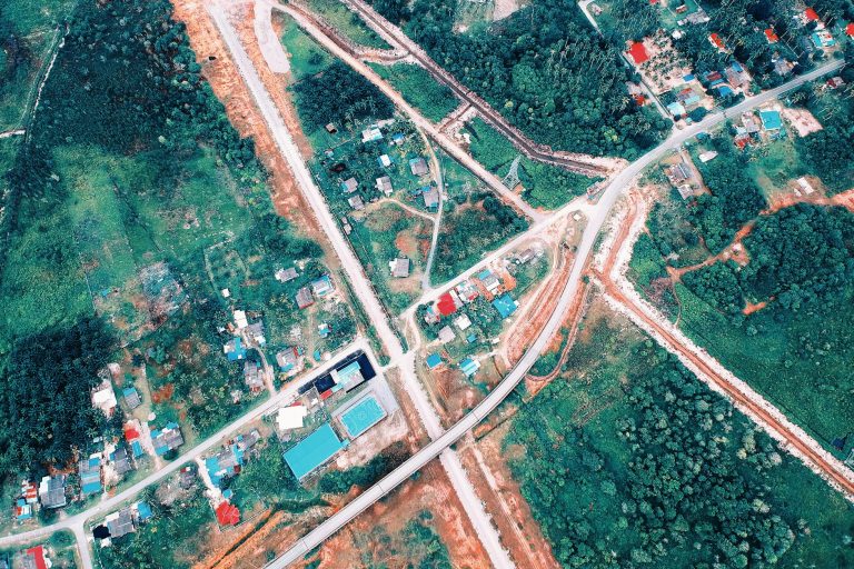 aerial photo of houses and roads